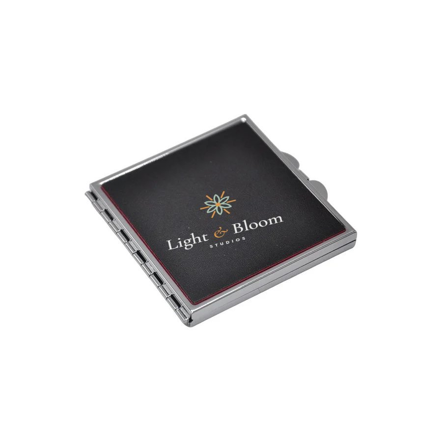 Compact mirror personalised with the Light & Bloom logo
