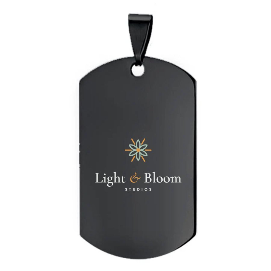 Black stainless dog tag personalised with the Light & Bloom logo