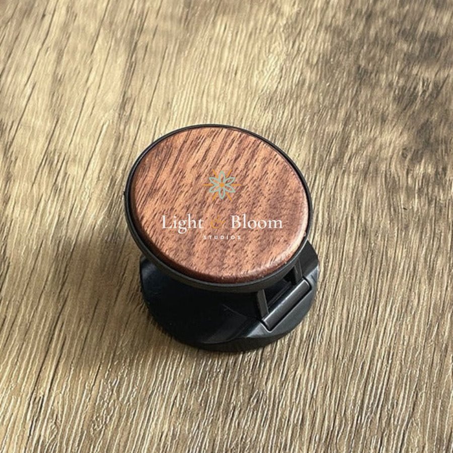 Phone grip holder personalised with the Light & Bloom logo