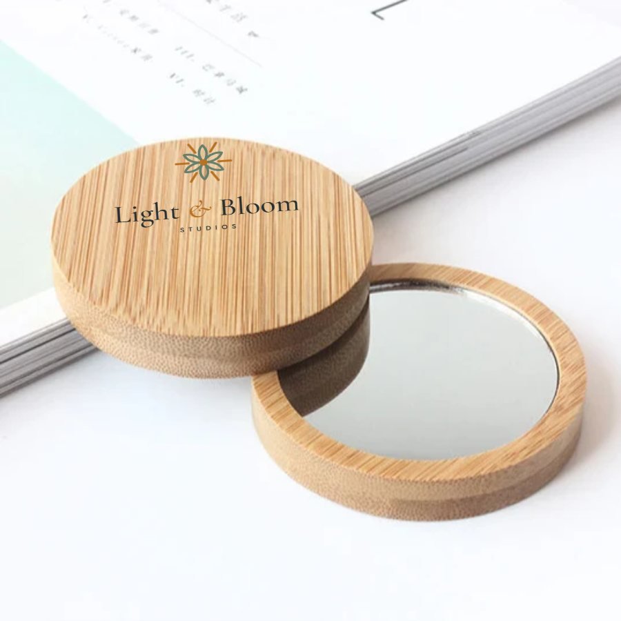 Wooden pocket mirror personalised with the Light & Bloom logo